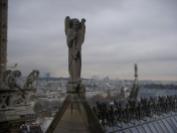 This statue at Notre Dame has probably stood perched on that roof for hundreds of years.